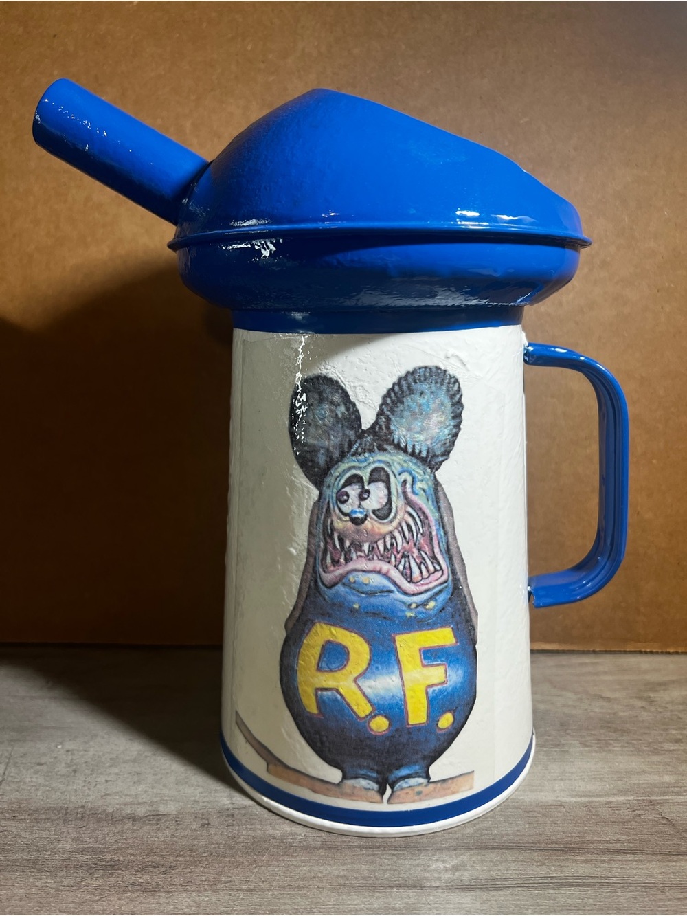Blue and White Ceramic Pitcher with RF Character Art